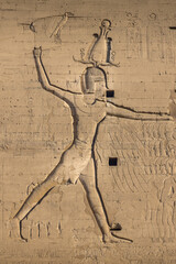 A relief on the wall of the Edfu temple, Egypt