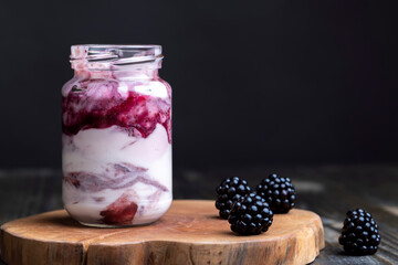 Fresh delicious milk yogurt with blackberry flavor