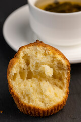 Soft and fresh fragrant wheat cupcake on a black stone