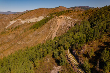 Naklejka premium Aerial view Autumn landscape travel of Altai mountains Russia meander road