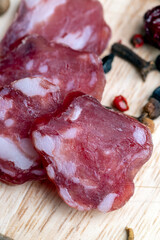 sliced sausage from pieces of meat with bacon