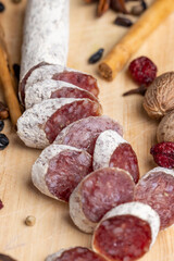 Chunks of sliced sausage with white mold