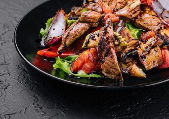 Vegetable and beef salad in a plate