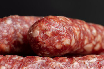 Dried pork sausage during slicing
