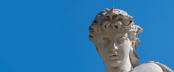 Close up Olympic goddess of love in antique mythology Aphrodite (Venus) Fragment of ancient statue. Copy space. © zwiebackesser