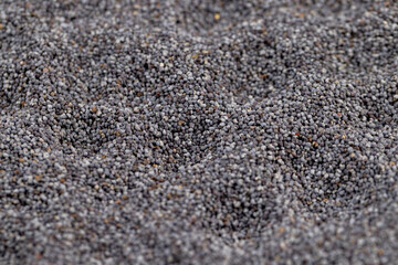 a close-up of a pile of poppy seeds used in cooking