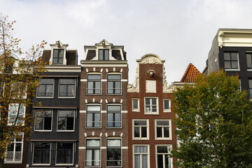 Fototapeta na wymiar Row of Beautiful Old Historic Buildings in the Amsterdam Centrum District