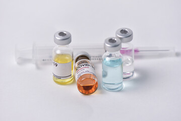 Vaccine bottle. Syringe on white background. Vaccination against quarantine coronavirus or covid-19, virus prevention and infection control. drug therapy concept