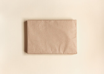 rectangular package in kraft wrapping paper top view