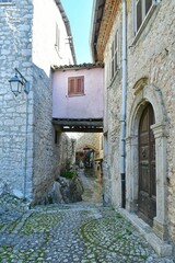A narrow street among the old houses of Fumone, a historic town in the state of Lazio in Italy.