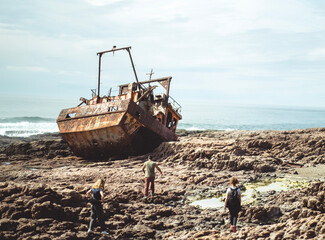 old fishing boat stranded