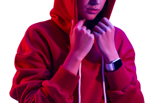 Close-up Neon light color Portrait of Sporty woman in red hoodie. Lips and hands in frame, girl holding her hood. Elegant hands with a smart watch. Isolated PNG photo.