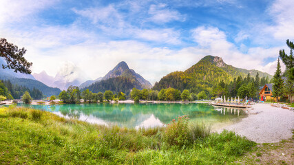 Incredible landscape on Jasna lake with beautiful reflections of the mountains.