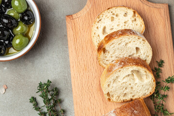 bread ciabatta and olives. banner, menu, recipe place for text, top view