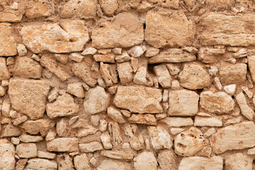Structure of an old Mediterranean natural stone wall - 8795
