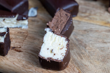 sweet cottage cheese with sugar covered with a thin layer of milk chocolate