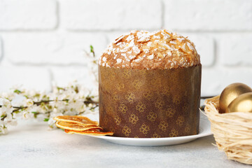 Easter cake with sugar powder on gray background