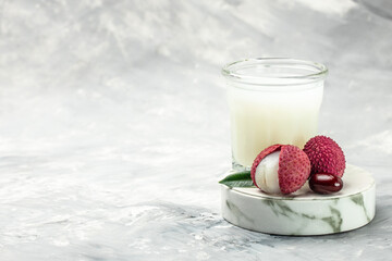 Lychee Juice. lychee cocktail in glass and fresh fruits. Restaurant menu, dieting, cookbook recipe top view