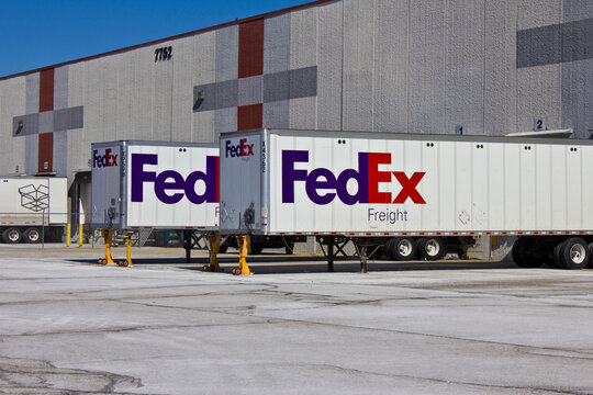 Federal Express containers in loading docks. FedEx is a global courier delivery services company.