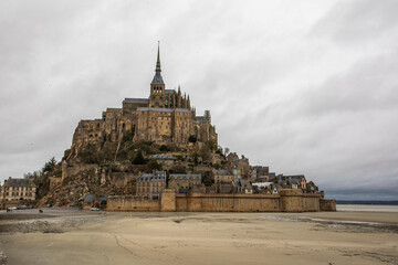 Mont Saint Michel Abbey in Normandy, France, Europe during a cloudy day