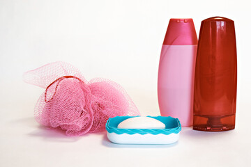 Shampoo and conditioner for hair, and a washcloth with soap. Spa procedures. Close-up