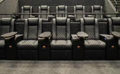 Luxurious auditorium, cinema, beautiful comfortable chairs.