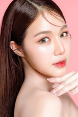 Young Asian woman long hair with natural makeup on face have plump lips and clean fresh skin on...