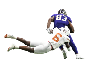 Young athletic football players making amazing plays during a competitive game