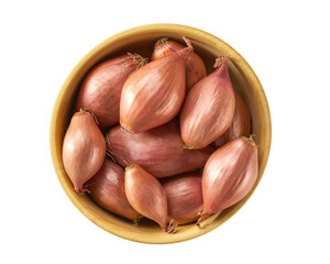 onions shallots in a wooden bowl isolated on wooden background, top view.