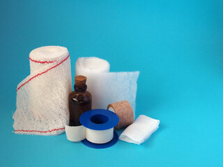Various dressing materials isolated on blue background