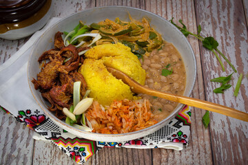 Vegan corn mush mamaliga, seitan, beans fermented vegetables and beans as Eastern European bowl