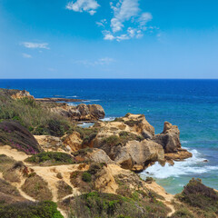 Summer Atlantic rocky coast view (Albufeira outskirts, Algarve, Portugal).