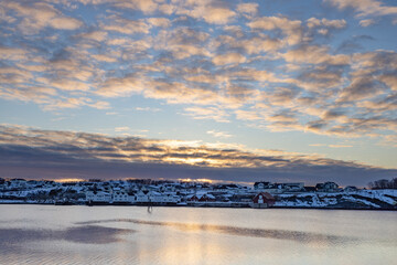 Sunset over the sea in Brønnøysund harbor,Helgeland coast,Norway