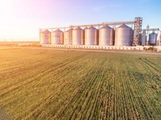 Grain elevator. Metal grain elevator in agricultural zone. Agriculture storage for harvest. Grain...