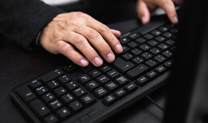 Hands in Action: Working tirelessly on the computer to achieve your goals