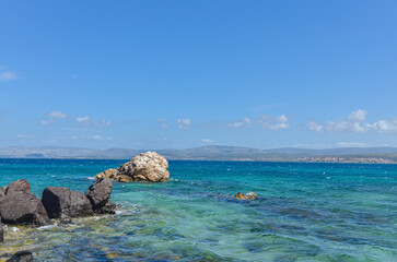 scenic view of Ildir Bay and Karaburun Peninsula from Dodo Beach in Ardic (Cesme, Izmir region, Turkey) © ssmalomuzh