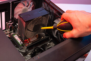 Technician use air blower ball to clean dust in circuit board computer. Repair upgrade and...