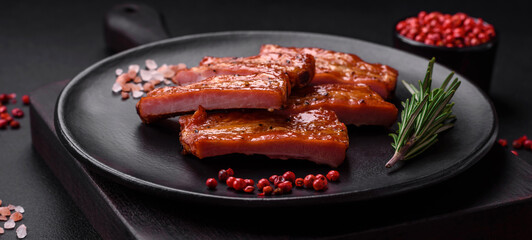 Grilled fresh juicy ribs with salt, spices and herbs
