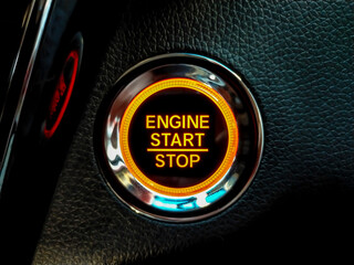 Engine Start or stop button in a conventional modern car. Car instrument panel, interior dashboard...