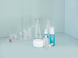 skin serum, moisturizing and whitening serum, fruit acids.Glass Volumetric Flask  ,Laboratory Flasksare used for  laboratory work  in the background