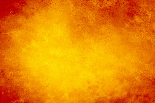 Yellow orange red abstract grunge background for design. Color gradient, ombre. Toned rough cracked concrete wall surface. Bright. Colorful. Fire, burn, lava, burst, splash, flame, glow.