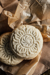 close up of maamoul (ma'amoul), date-filled butter cookies with a decorative pattern. Ma'amoul is a popular dessert throughout the Middle East for holidays such as Easter or Eid.