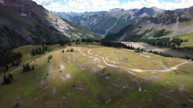  Governor Basin near Ouray, Colorado with Sneffels Mining District in the distance. Aerial 4K drone video in the Rocky Mountains.

