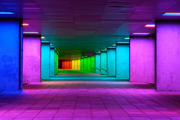 Colorful mulitcolord illuminated gallery tunnel rainbow passage under NAI building, Nederlands Architecture Institute near Museum Park, Rotterdam, The Netherlands - Powered by Adobe