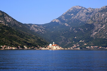 Montenegro, Kotor Bay. Beautiful church on island, Madonna on reef, near Perast in Montenegro. summer, spring, Crna Gora