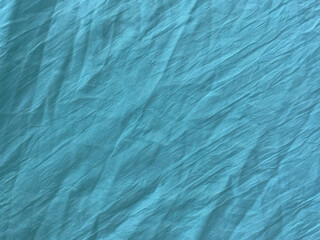 beautiful natural crumpled cotton textile background. suitable for designs and art projects