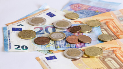 Closeup of Euro money banknotes and coins. Official European union currency.