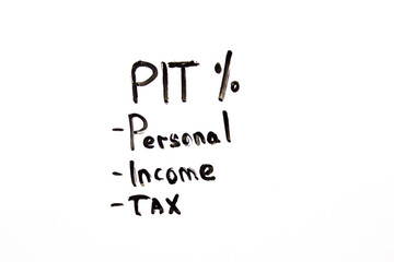 PIT Personal Income Tax text concept written in marker with percent symbol.