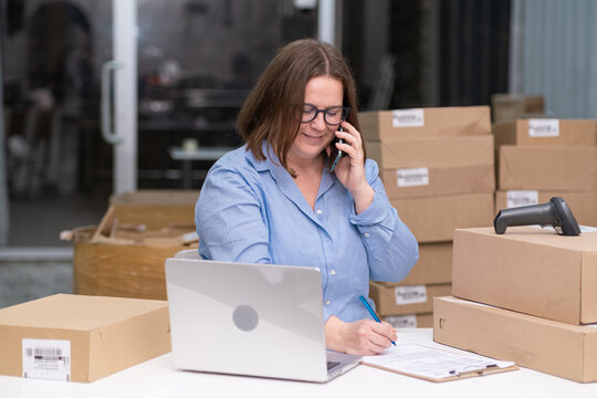 dropshipping business woman with table laptop, shipping boxes, retail marketplace for online sales