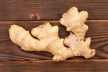 ginger root on wood background